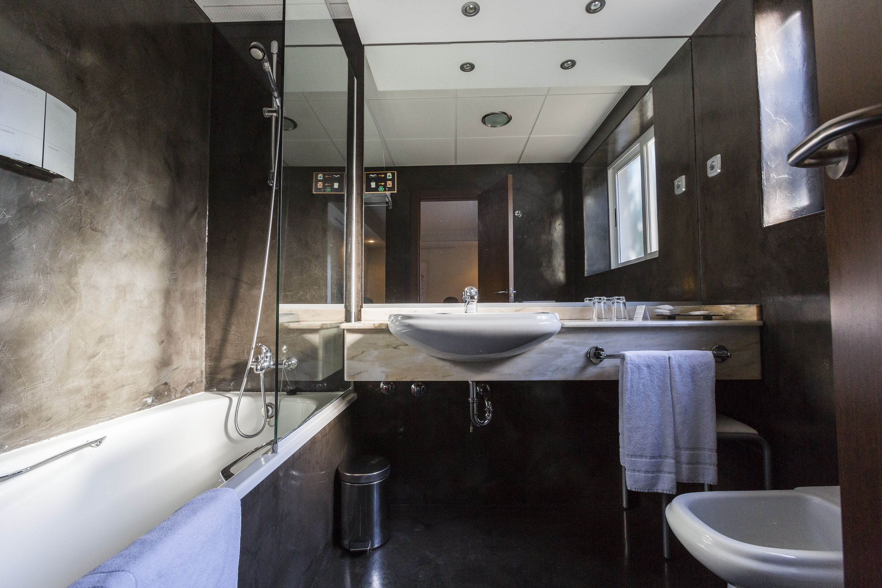 free toiletries, hair dryer, bidet, towels