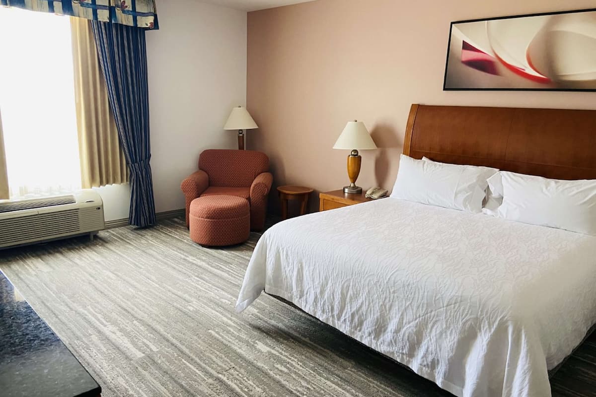 one king bed, corner | iron/ironing board, free cots/infant beds, rollaway beds, free wifi