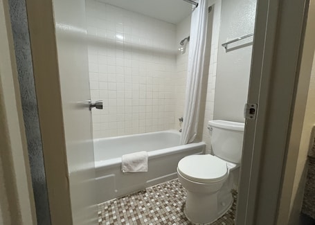 Deluxe Room, 2 Double Beds, Non Smoking | Bathroom | Bathtub, hair dryer, towels, soap. EZ Travel Inn