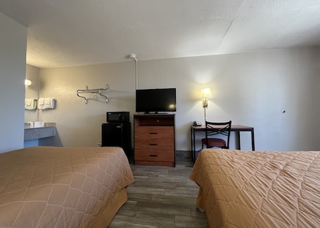 Deluxe Room, 2 Double Beds, Non Smoking | Desk, laptop workspace, blackout drapes, iron/ironing board. EZ Travel Inn
