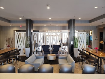 Relax in style with comfortable seating and a modern design. at DoubleTree by Hilton North Charleston - Convention Center