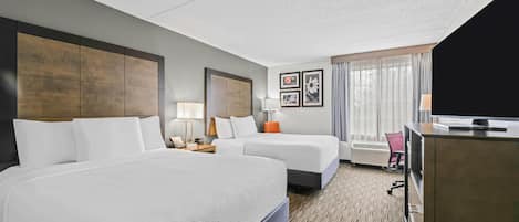 Premium bedding, desk, laptop workspace, iron/ironing board