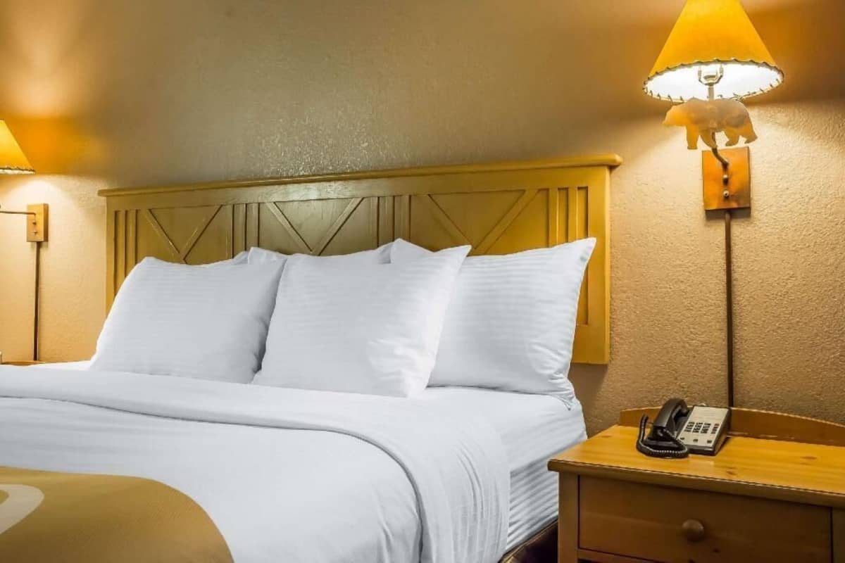 Premium bedding, desk, laptop workspace, soundproofing