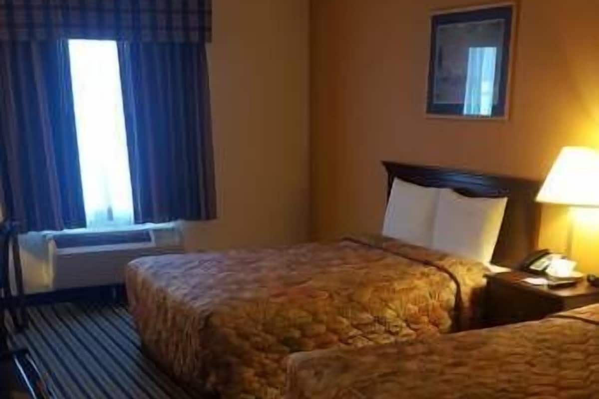 Standard Room, 2 Queen Beds, Smoking | Desk, iron/ironing board, cribs/infant beds, rollaway beds