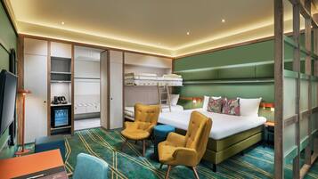 Family Quadruple Room, 1 Bedroom | In-room safe, desk, laptop workspace, iron/ironing board