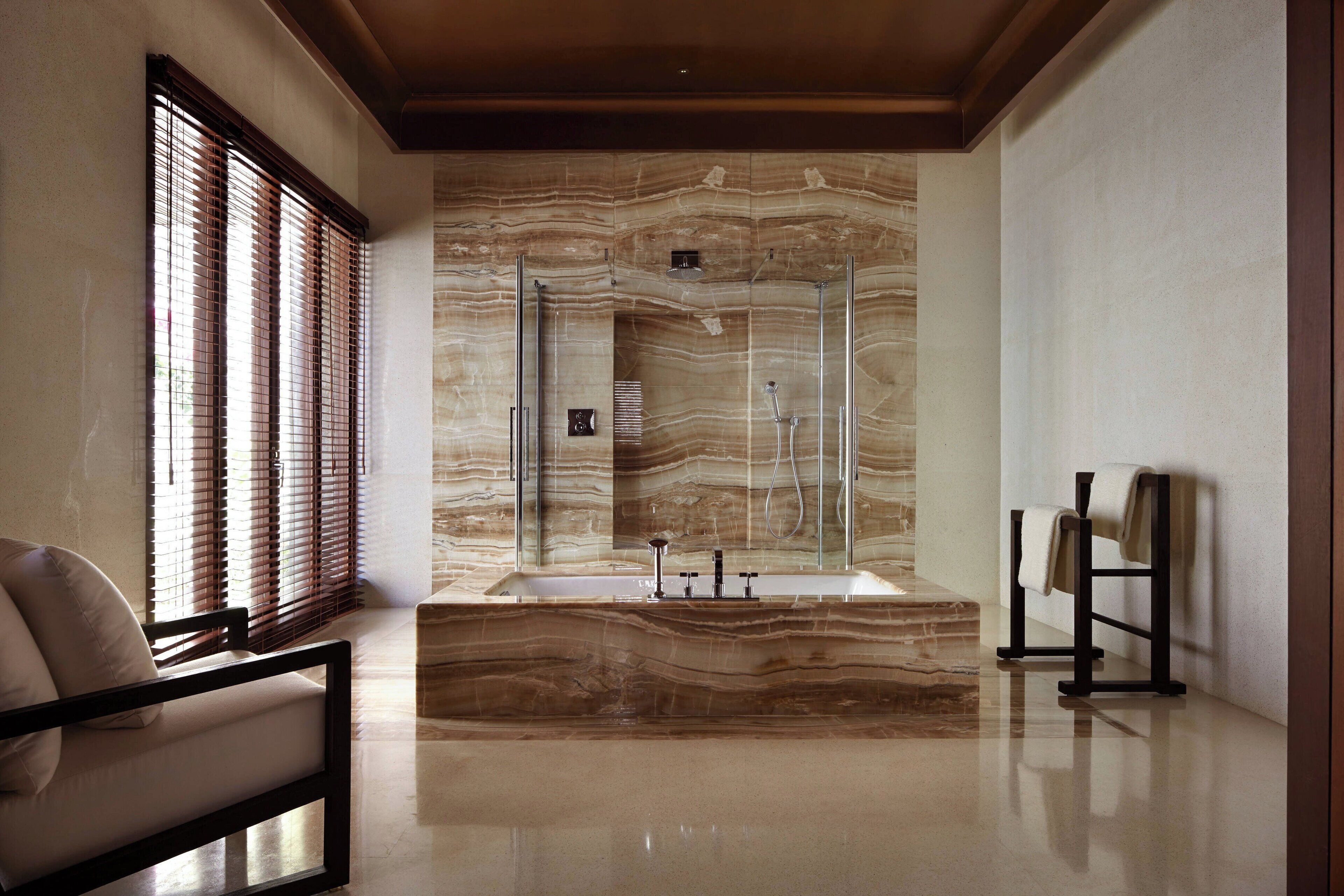 separate bathtub and shower, deep-soaking bathtub, rainfall showerhead