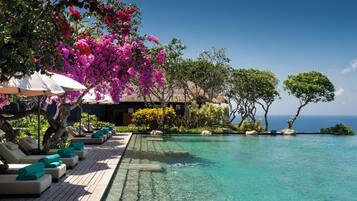Outdoor pool, free cabanas, pool umbrellas