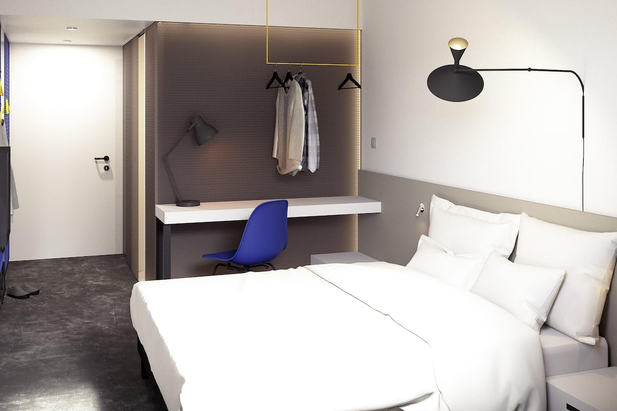 Chambre Premium, 1 lit double | Coffres-forts dans les chambres, bureau, fer et planche Ă repasser