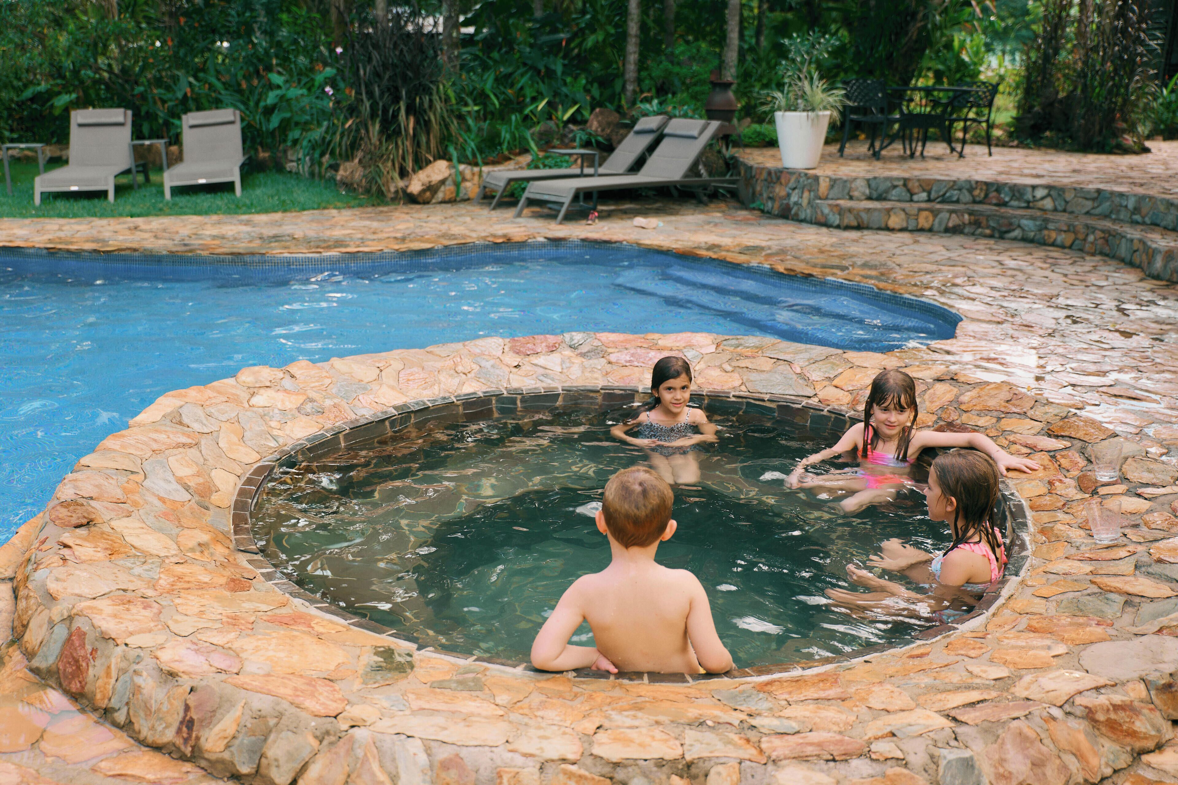 Outdoor pool, pool umbrellas, sun loungers