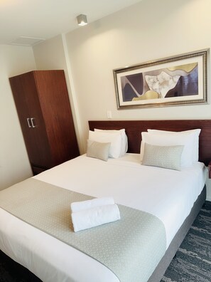 Premium bedding, in-room safe, desk, blackout drapes