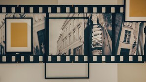 A filmstrip with three photographs: a yellow square, a building with a clock, and a building with a window. - ibis Styles Tallinn (Tallinn)