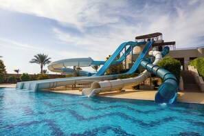 A water park with multiple slides and a pool. - JAZ Solaya (El Quseir)