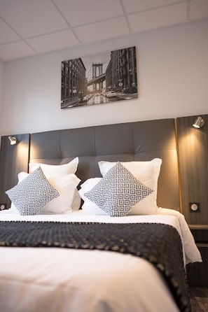 Literie de qualité supérieure, surmatelas, minibar