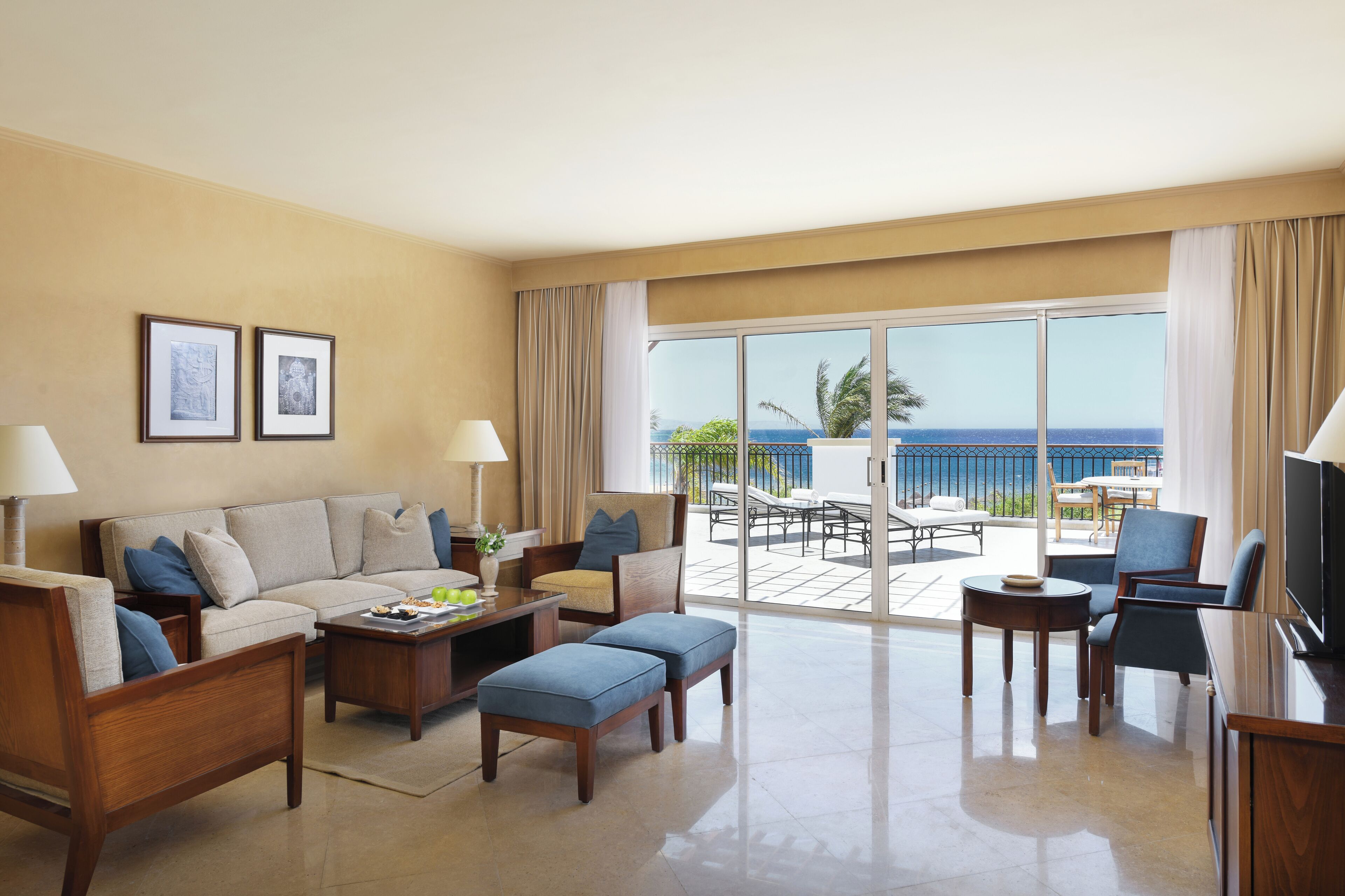 royal suite, 1 queen bed, sea view | living area | 32-inch lcd tv with satellite channels, tv