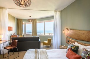 Quarto júnior, para não fumantes, vista para o oceano | Roupas de cama premium, cofres nos quartos, escrivaninha