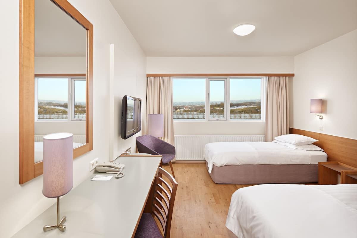 twin room | egyptian cotton sheets, premium bedding, in-room safe, desk