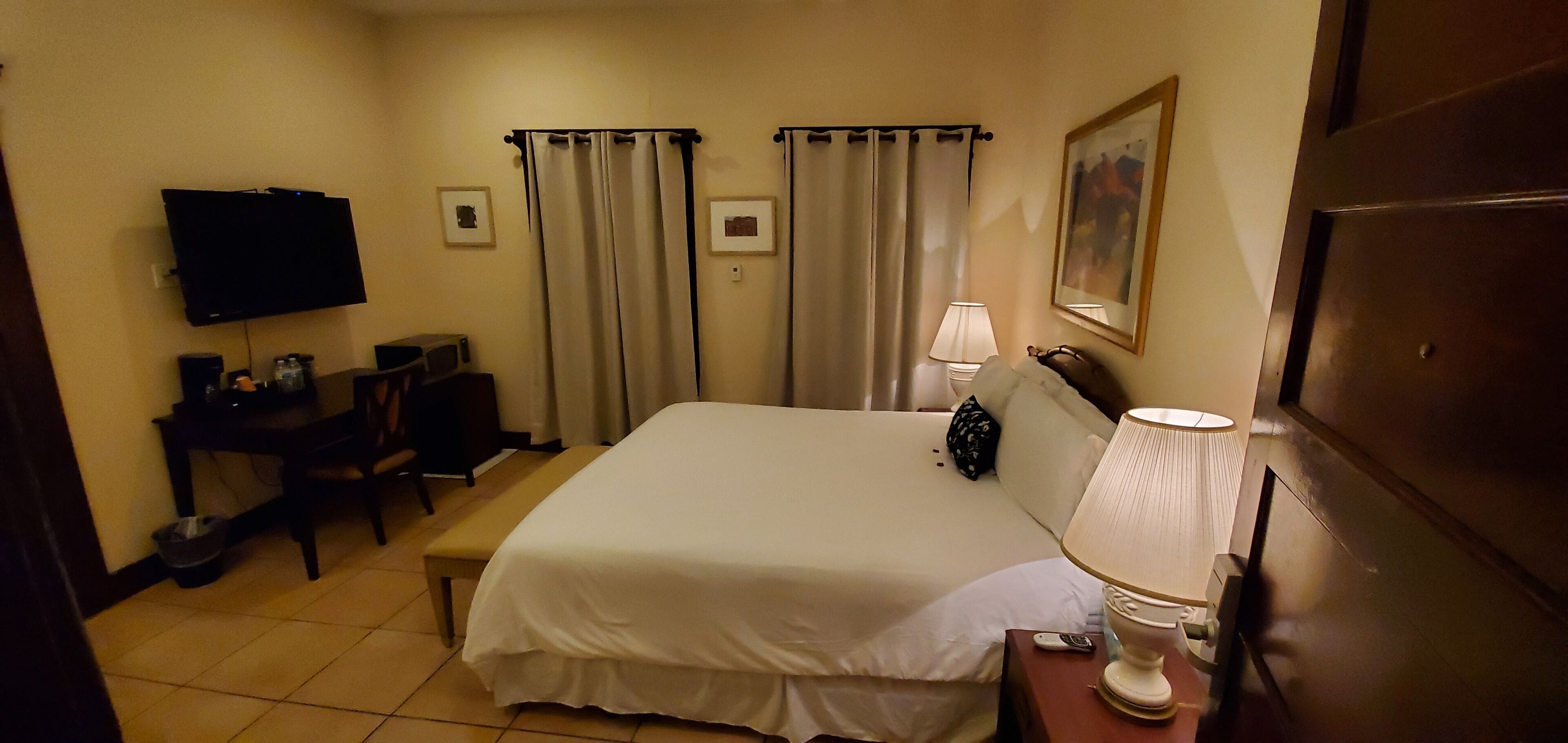 standard room, 1 queen bed, jetted tub | individually decorated, individually furnished, desk, blackout curtains