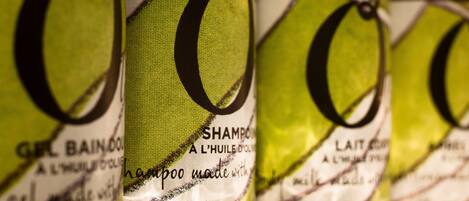 A close-up of shampoo bottles with labels.