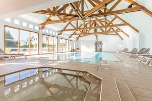 Indoor pool, seasonal outdoor pool, pool umbrellas, pool loungers