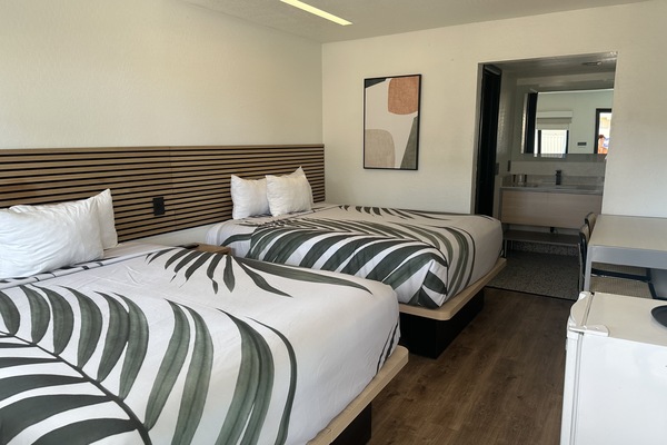 Basic Double Room, 2 Queen Beds | Iron/ironing board (on request), free WiFi, individually decorated