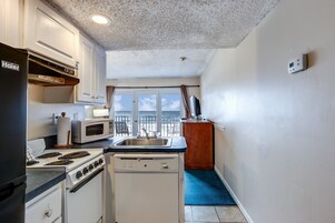 Fridge, microwave, stovetop, coffee/tea maker