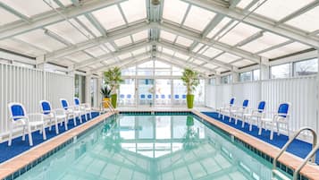 Indoor pool, open 10:00 AM to 10:00 PM, pool loungers