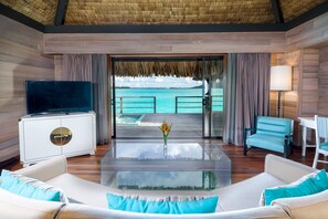 Premier Villa, 1 King Bed with Sofa bed, Overwater | Living area | 42-inch LCD TV with cable channels, TV, DVD player - The St. Regis Bora Bora Resort (Bora Bora)