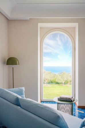 Megaride Apartment - La Villa | Living area | 50-inch TV with digital channels