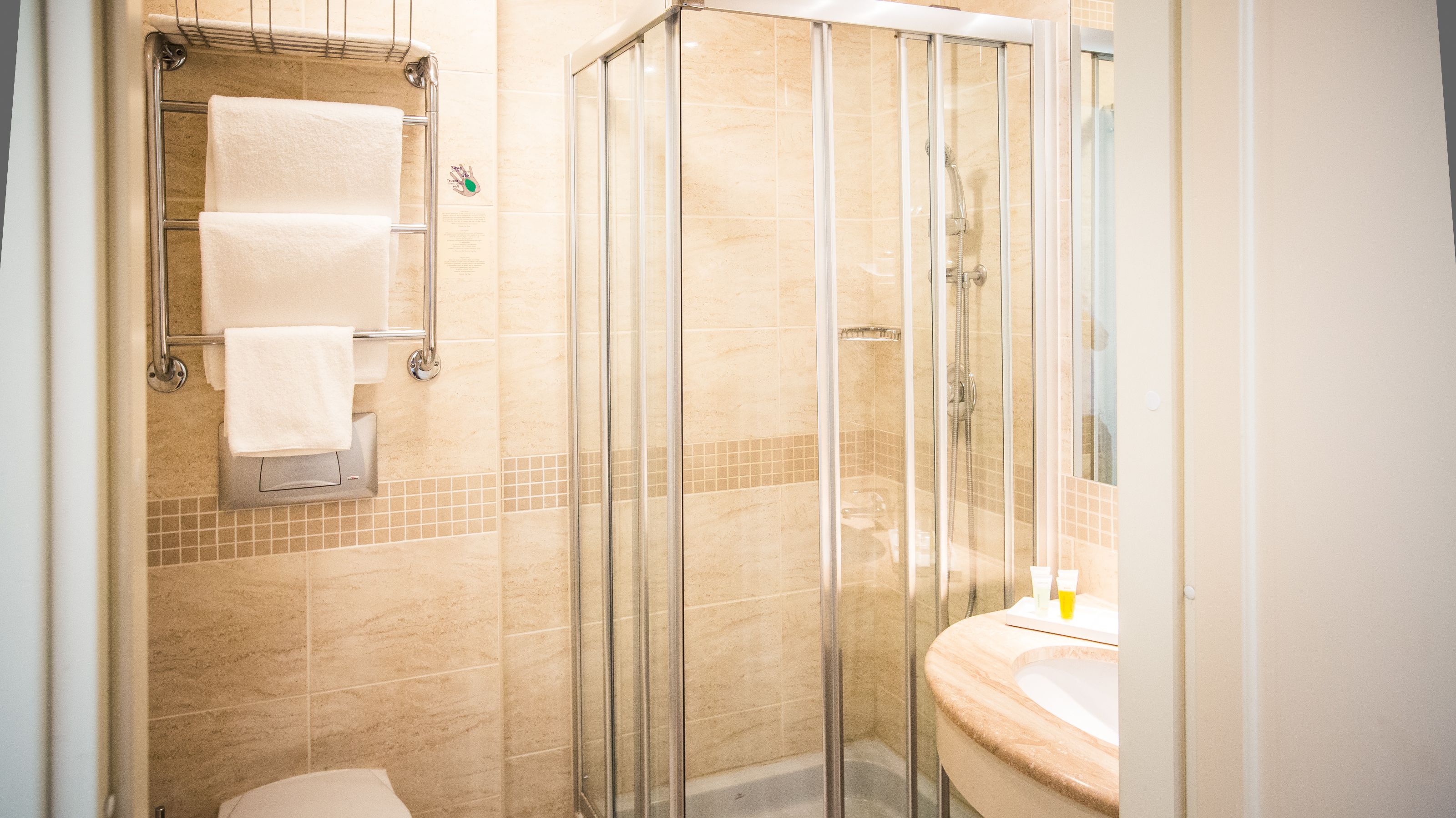 combined shower/bathtub, free toiletries, hair dryer, towels