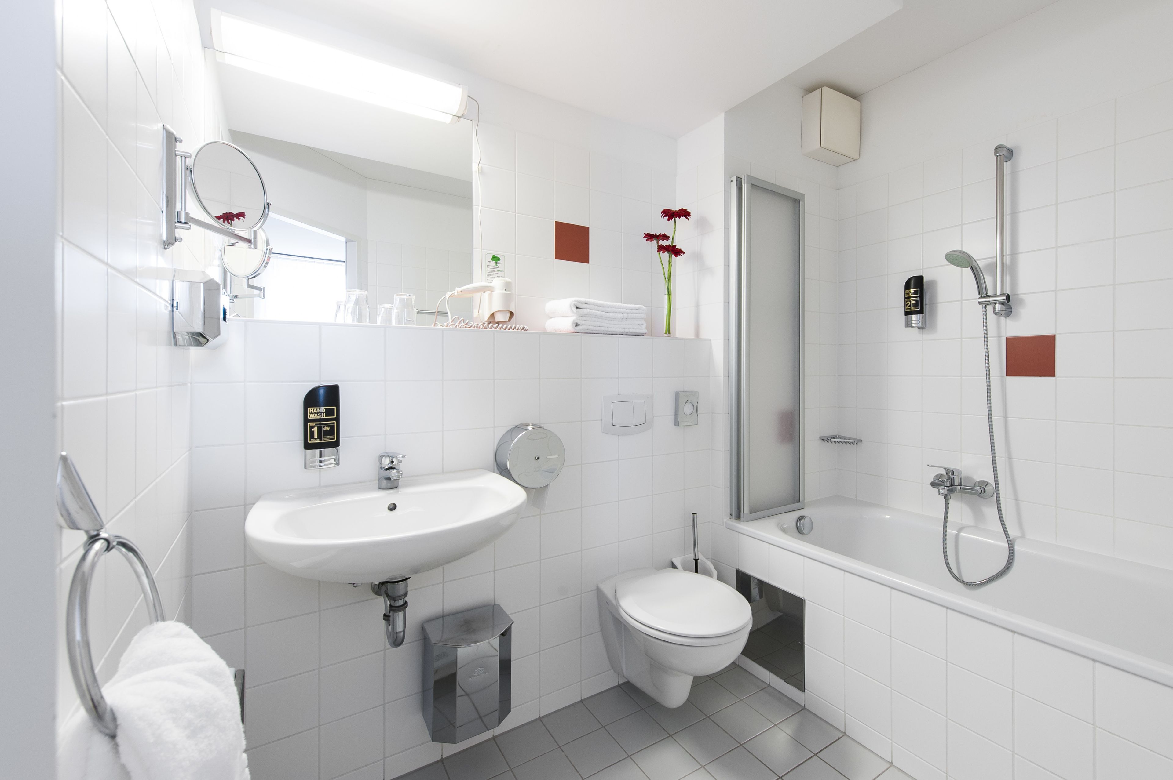 shower, free toiletries, hair dryer, towels