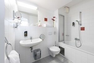 Shower, free toiletries, hair dryer, towels