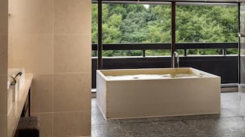 Separate tub and shower, deep soaking tub, free toiletries, hair dryer