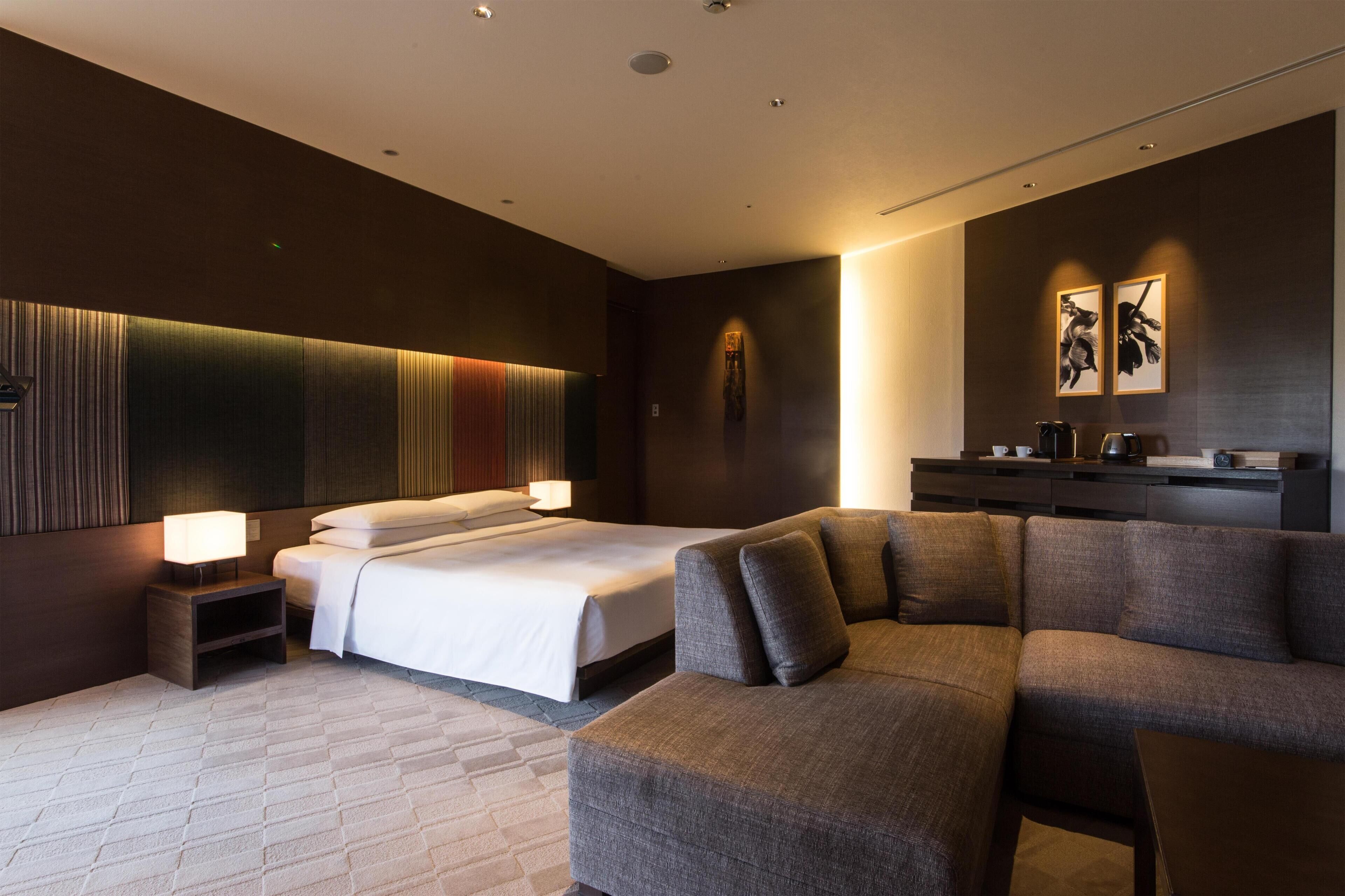 Deluxe Room, 1 King Bed, Balcony | Minibar, in-room safe, desk, blackout drapes