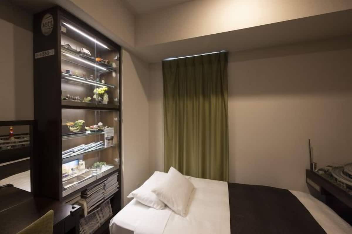 Down duvets, blackout curtains, free WiFi, bed sheets