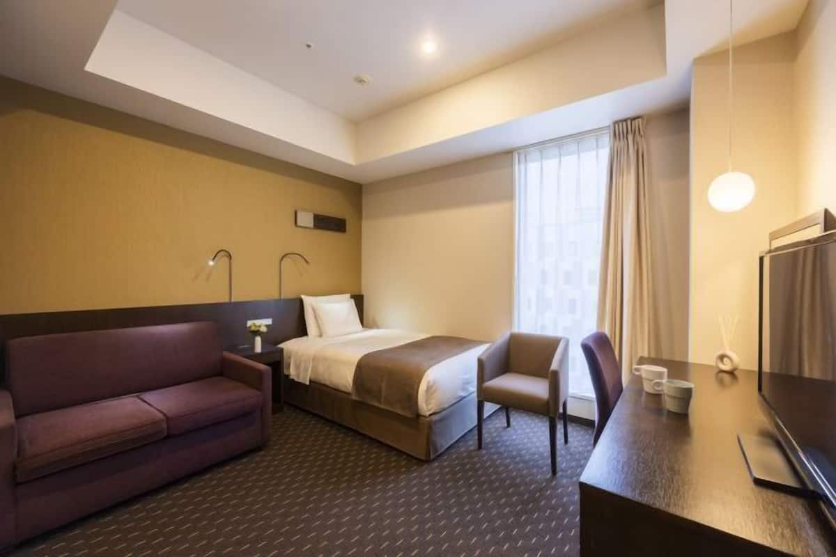 Down duvets, blackout curtains, free WiFi, bed sheets