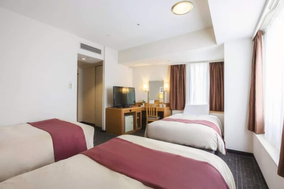 Desk, free WiFi, bed sheets