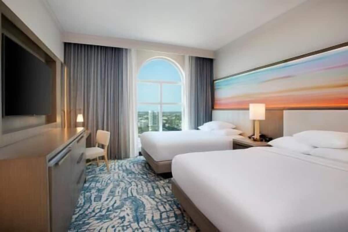 Hypo-allergenic bedding, down comforters, pillowtop beds, in-room safe