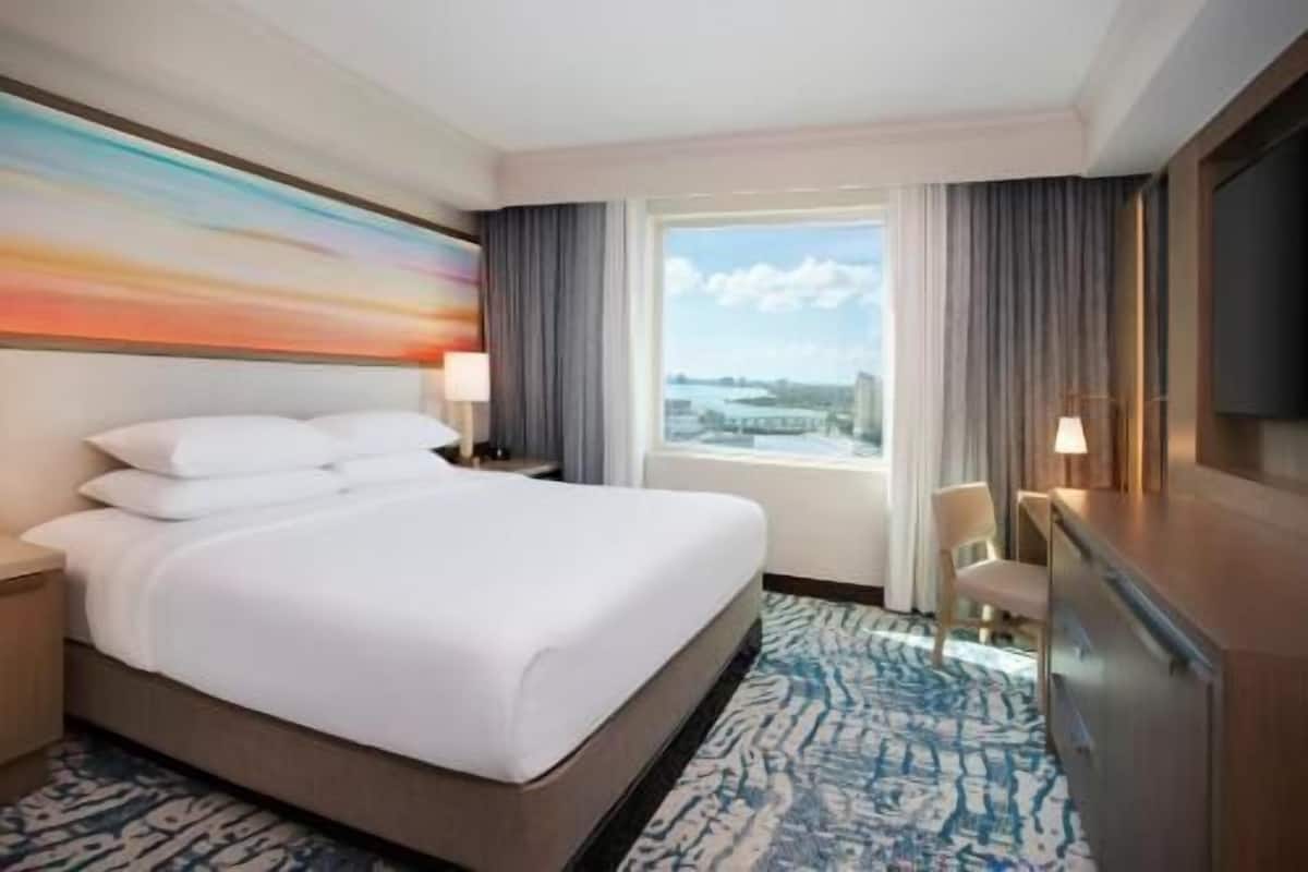 Hypo-allergenic bedding, down comforters, pillowtop beds, in-room safe
