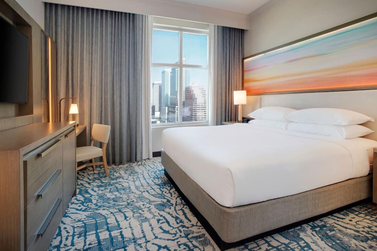 Hypo-allergenic bedding, down comforters, pillowtop beds, in-room safe