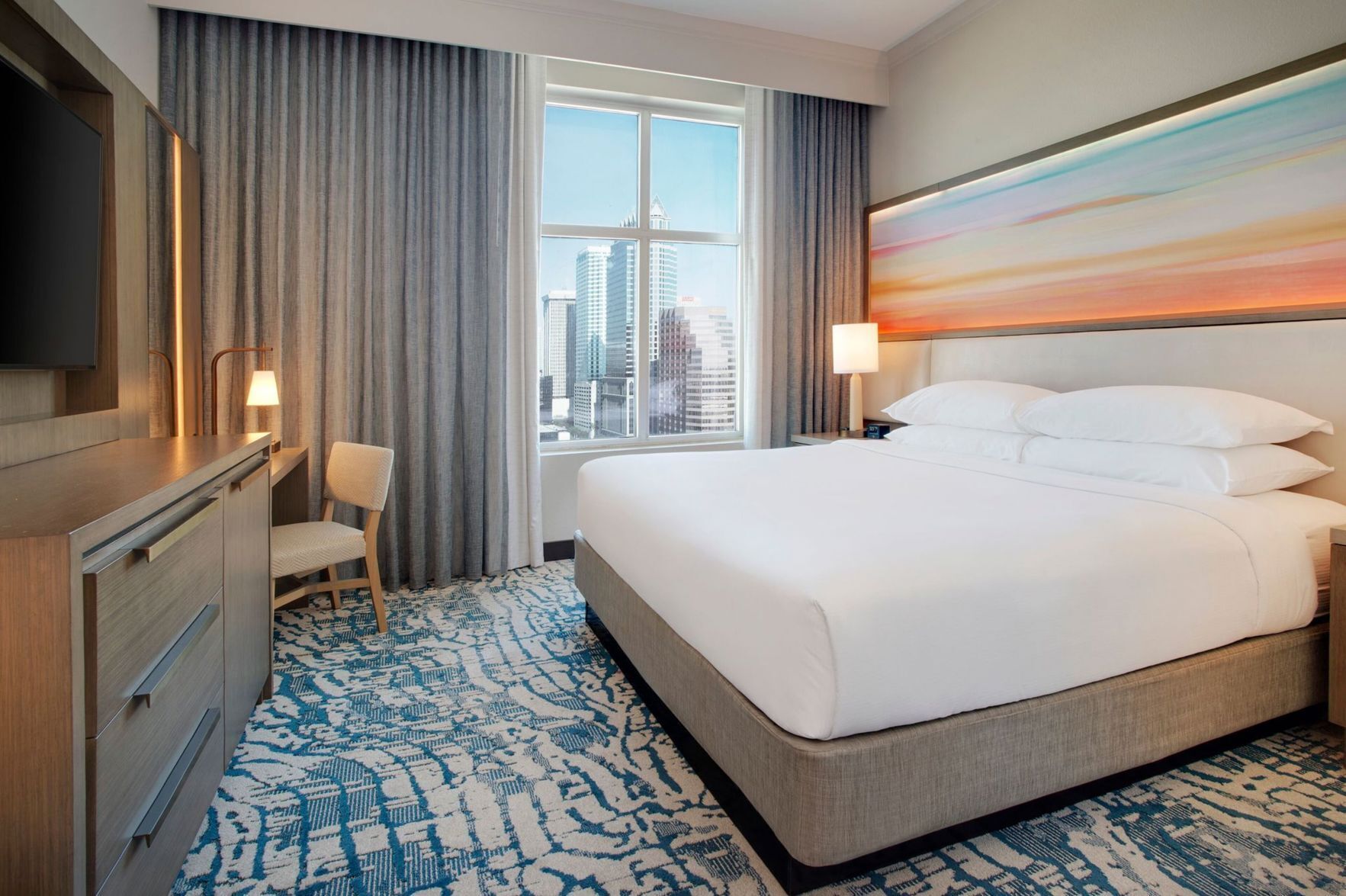 Hypo-allergenic bedding, down comforters, pillowtop beds, in-room safe