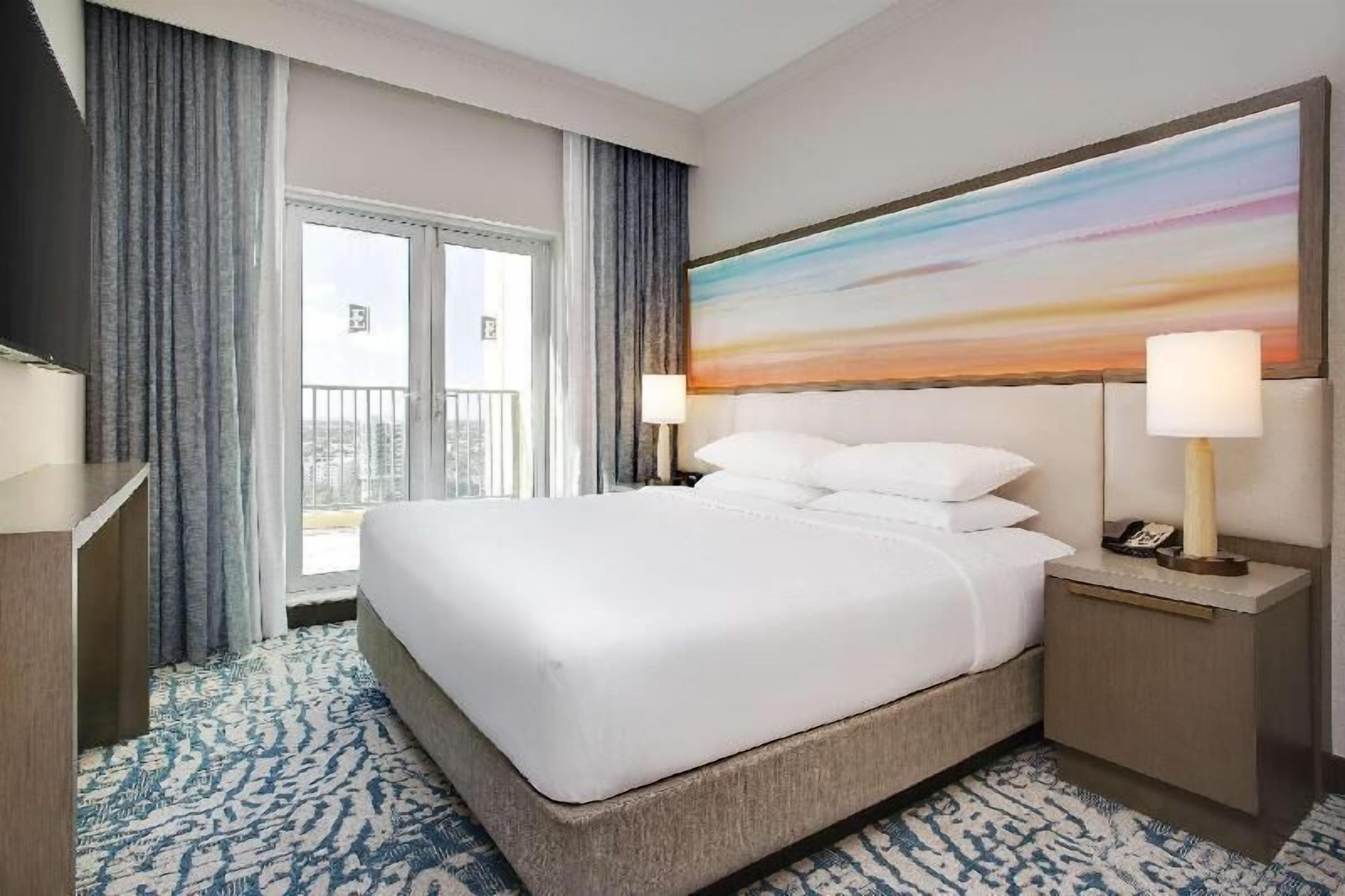 Hypo-allergenic bedding, down comforters, pillowtop beds, in-room safe