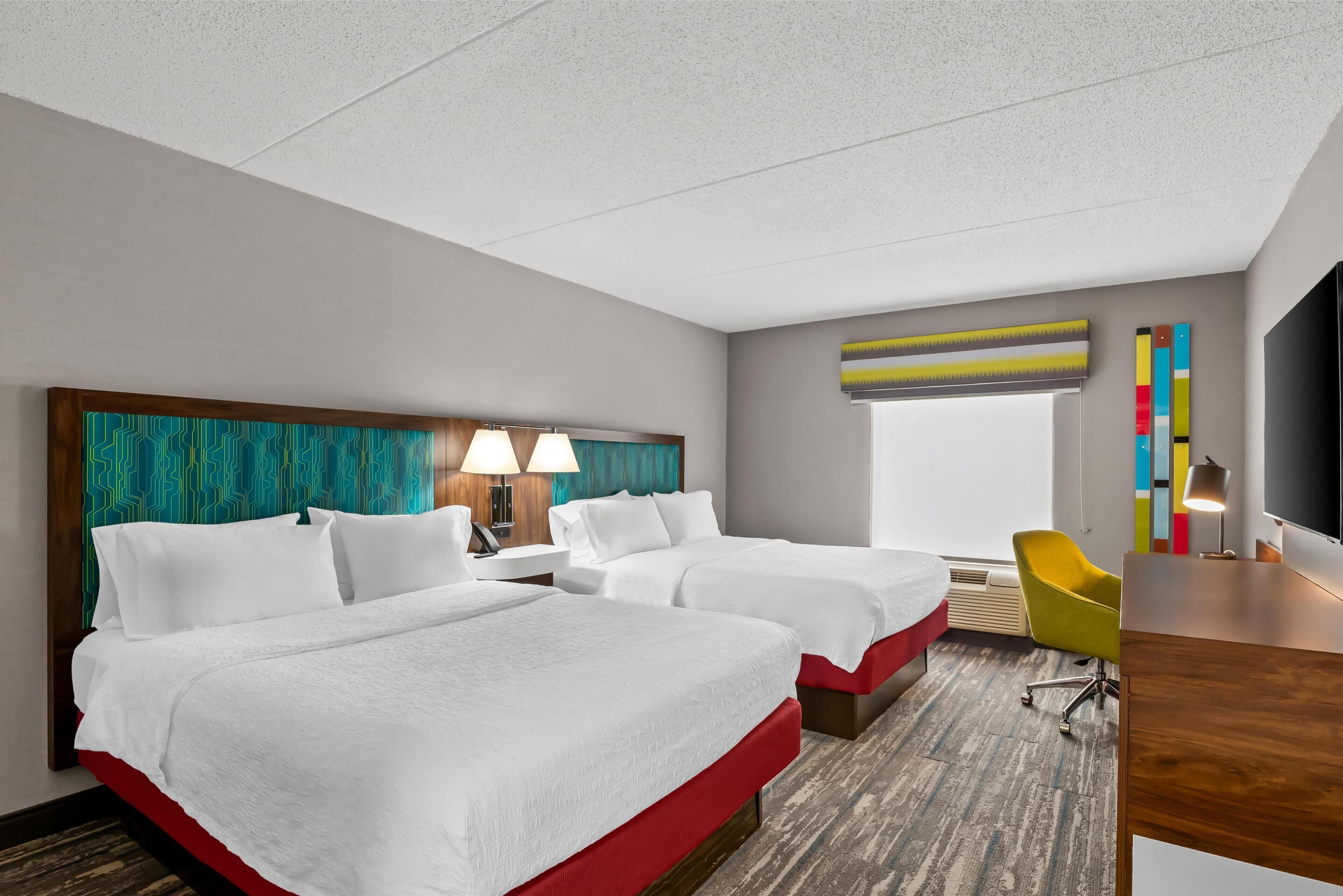 classic room, 2 queen beds | in-room safe, desk, laptop workspace, blackout curtains