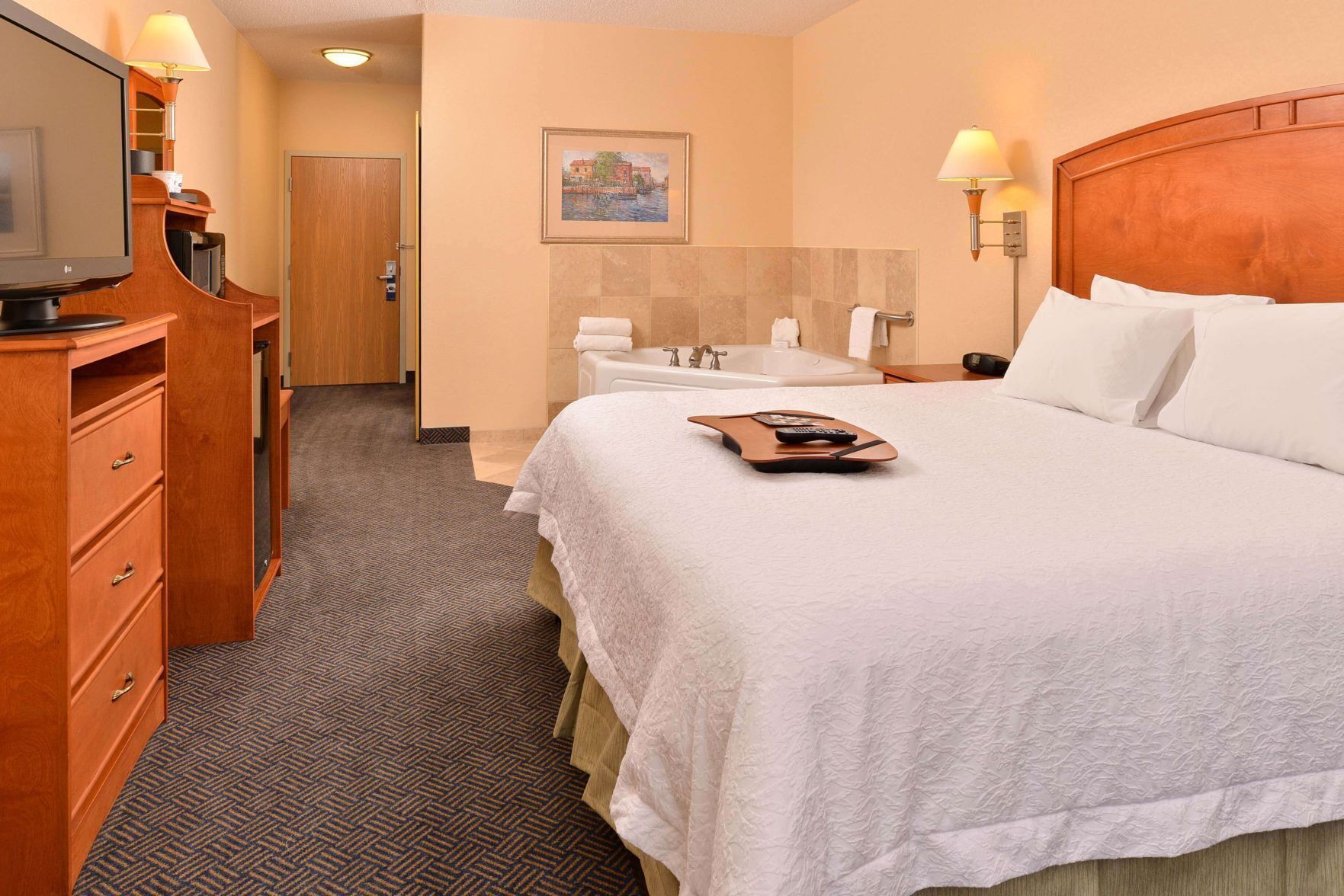 Premium bedding, pillow-top beds, blackout curtains, iron/ironing board
