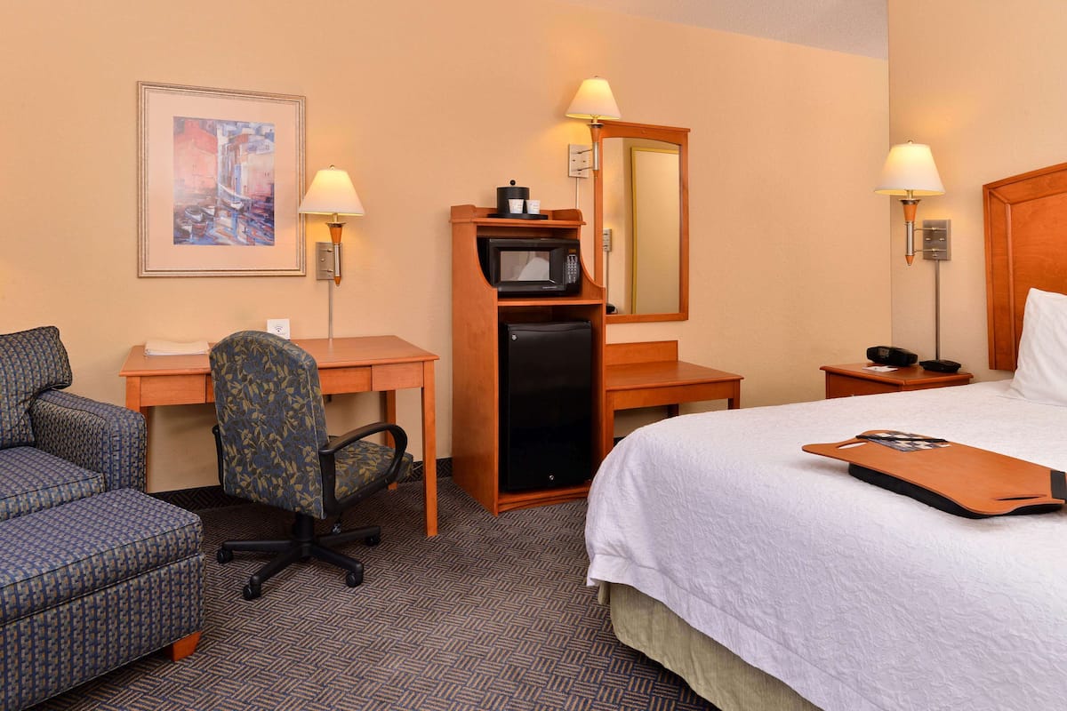 Premium bedding, pillow-top beds, blackout curtains, iron/ironing board