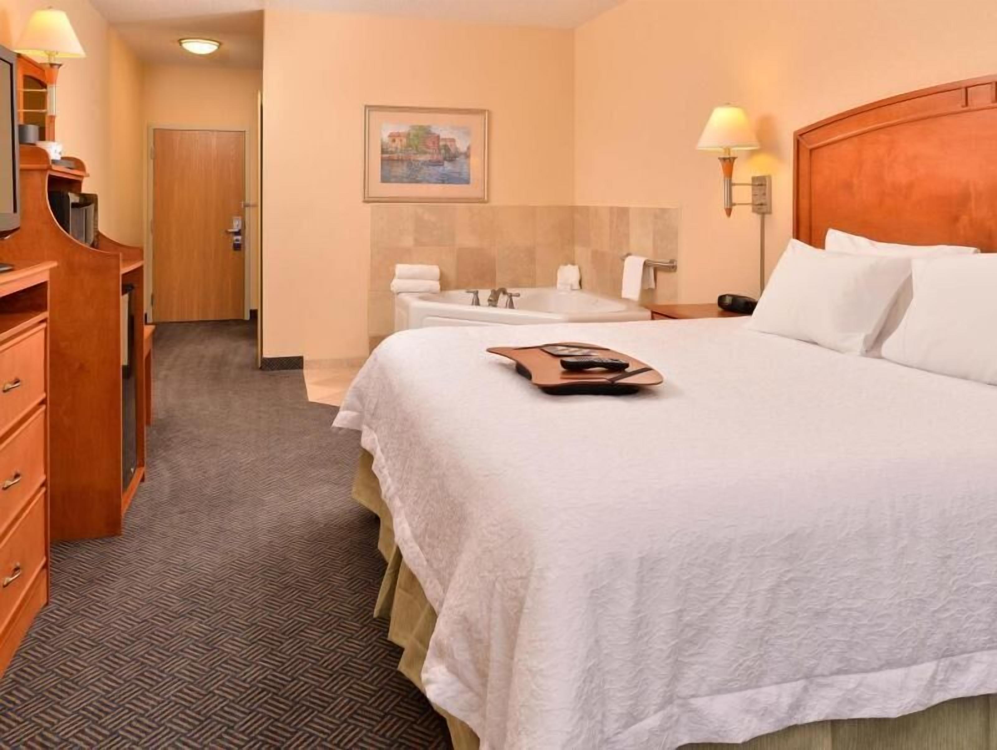 Premium bedding, pillow-top beds, blackout curtains, iron/ironing board
