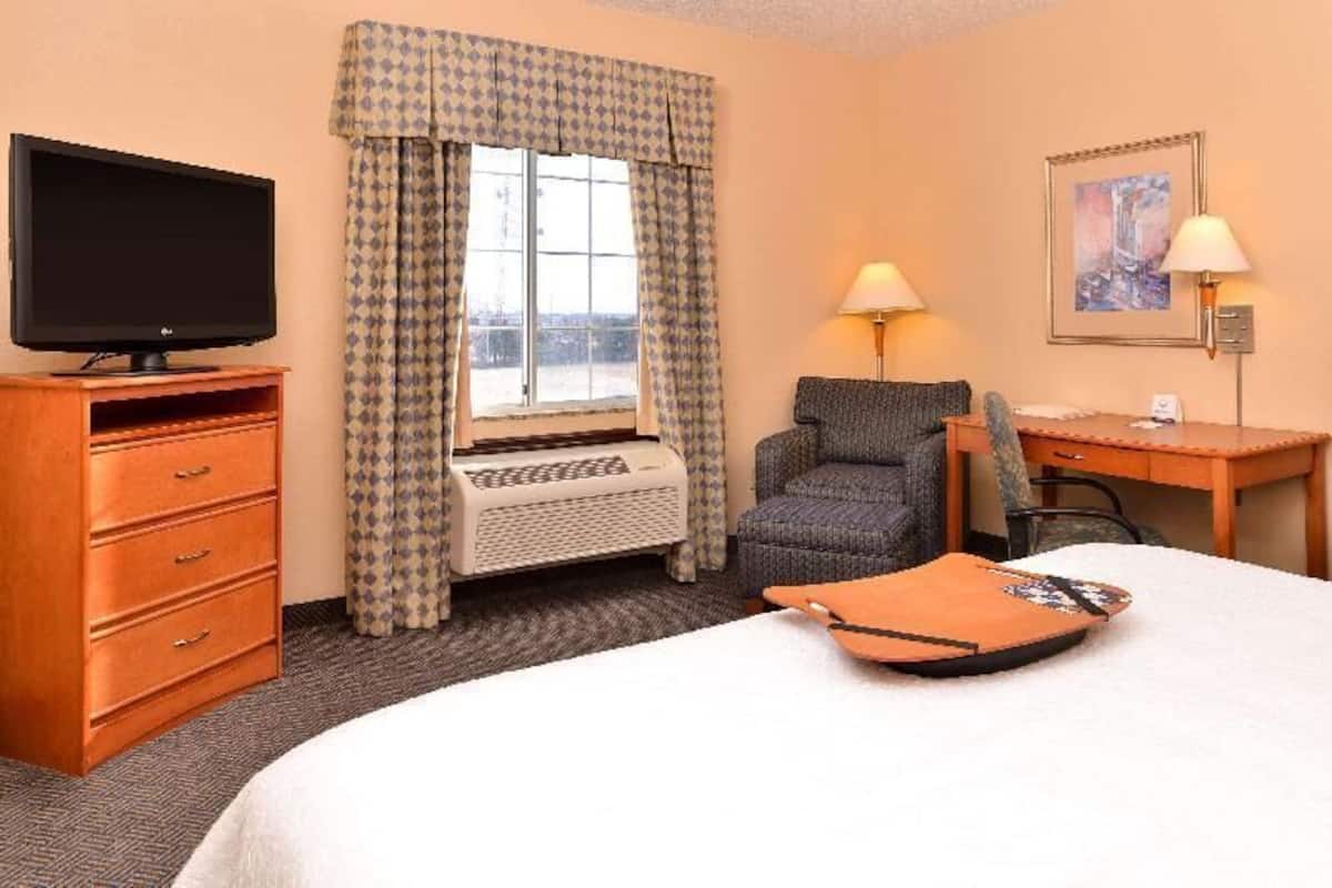Premium bedding, pillow-top beds, blackout curtains, iron/ironing board