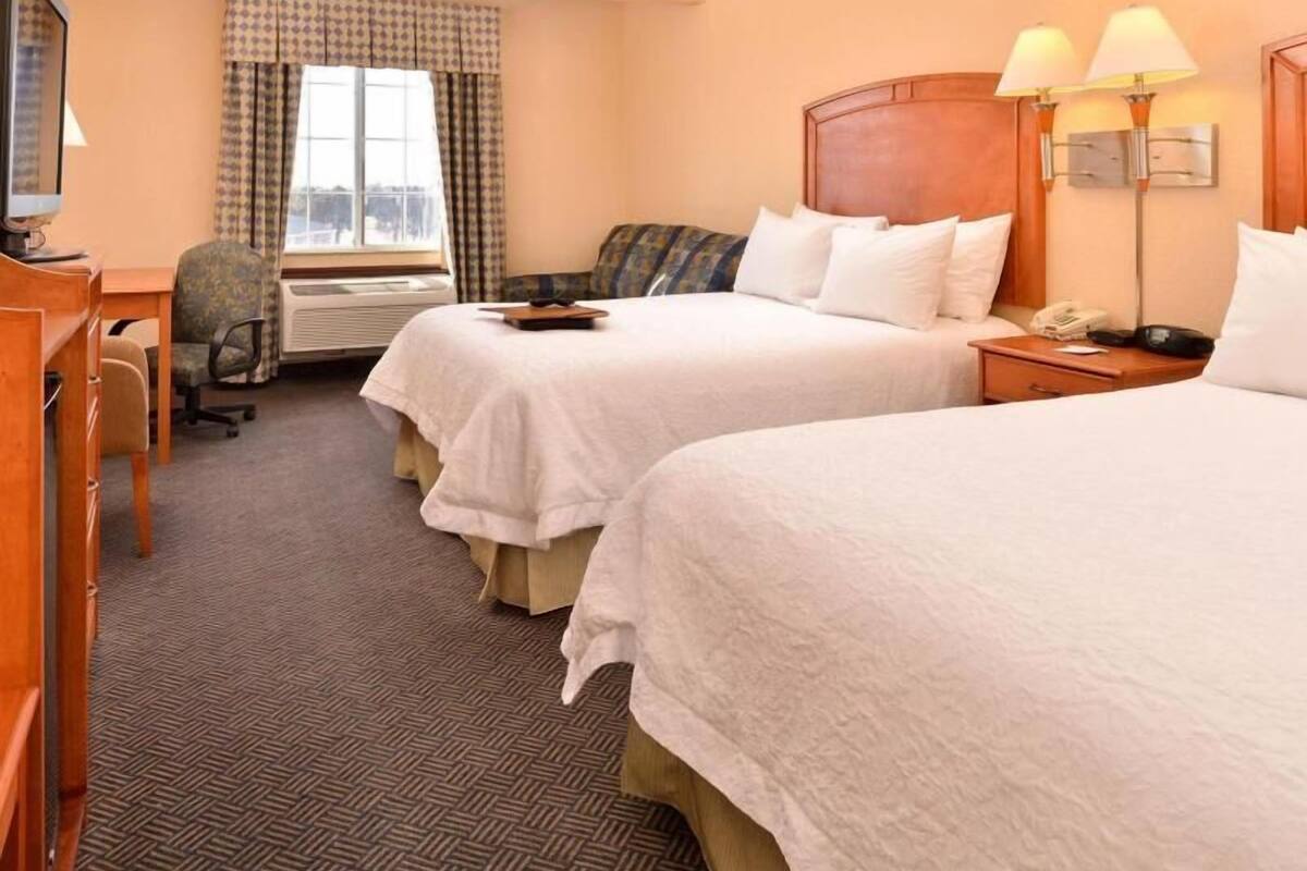 Premium bedding, pillow-top beds, blackout curtains, iron/ironing board