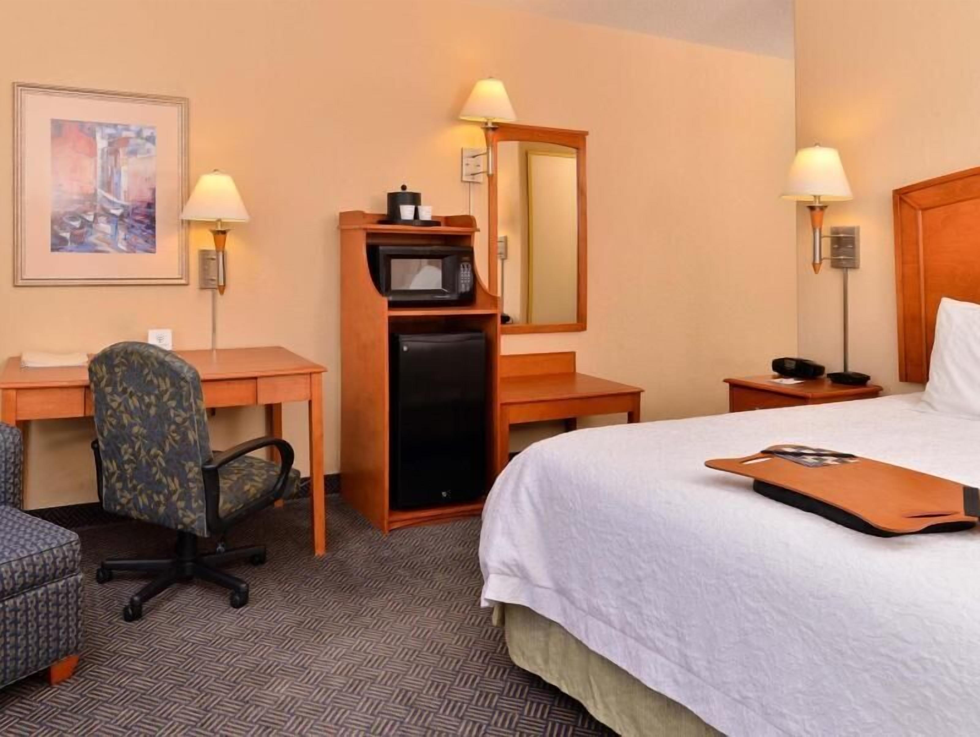 Premium bedding, pillow-top beds, blackout curtains, iron/ironing board
