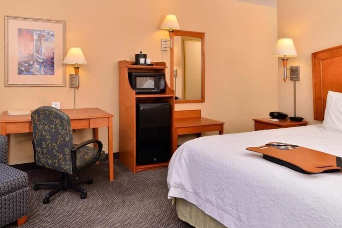 Premium bedding, pillow-top beds, blackout curtains, iron/ironing board