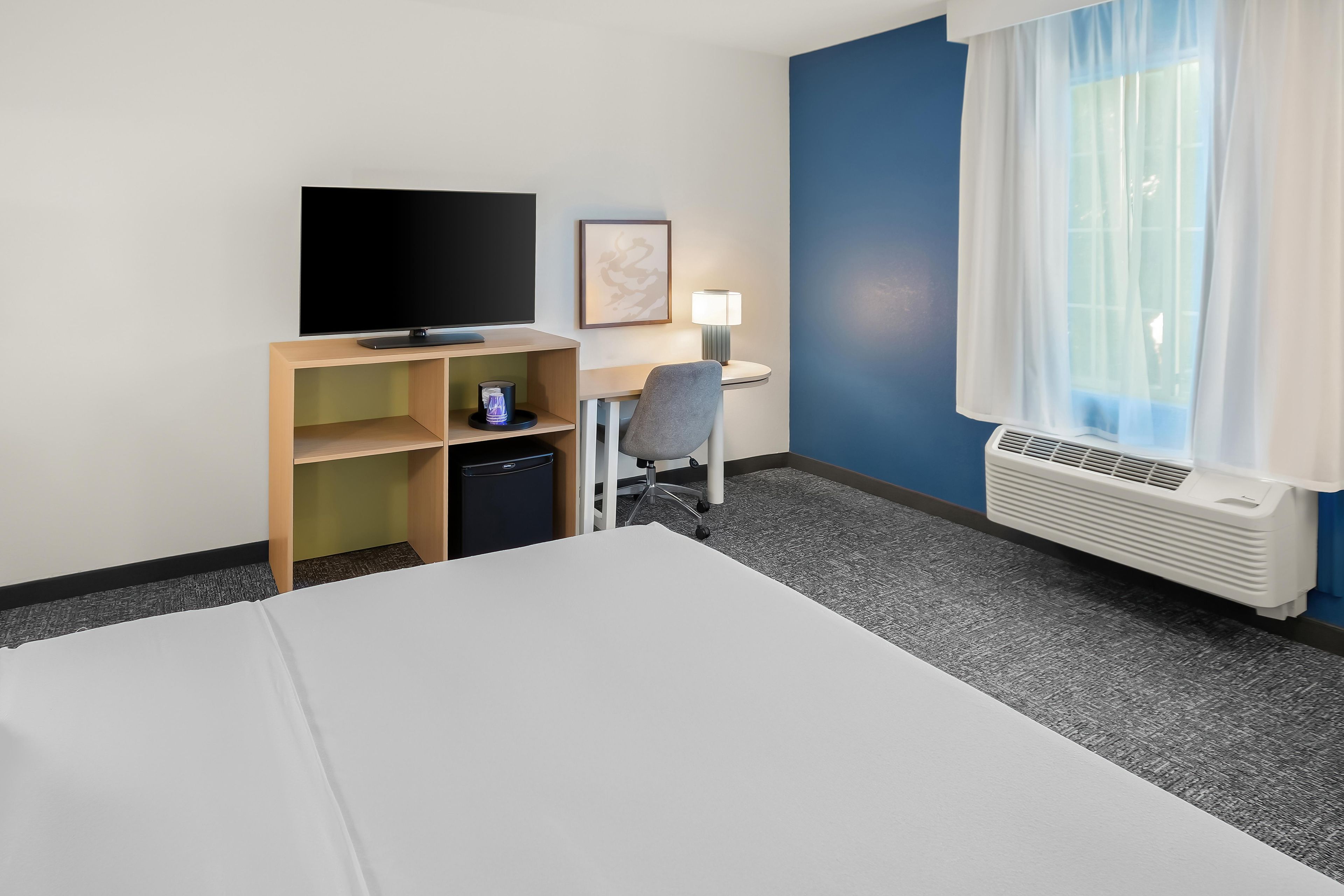 Premium bedding, pillowtop beds, blackout drapes, iron/ironing board
